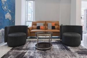 Uma área de estar em Georgetown Karpal Singh Getaway 4BR 娱乐设施洋房乔治市