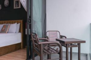 Uma cama ou camas num quarto em Georgetown Karpal Singh Getaway 4BR 娱乐设施洋房乔治市