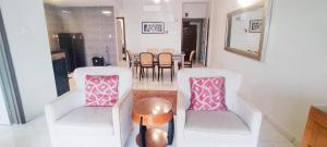 Ruang duduk di Regency Tanjung Tuan Beach PD by Idealhub
