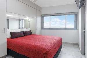 Ένα ή περισσότερα κρεβάτια σε δωμάτιο στο Ramada Suites by Wyndham Zen Quarter Darwin +37 φωτογραφίες