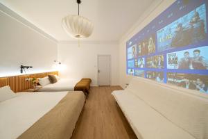 Tonight Aparthotel Jing'an Temple Shanghai客房内的一张或多张床位