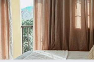 Studio Unit near Mines View Park, Baguio City客房内的一张或多张床位