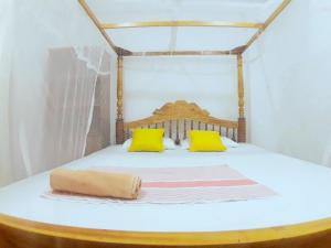 Voodi või voodid majutusasutuse Sasagara Beach Villa toas