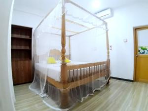 Voodi või voodid majutusasutuse Sasagara Beach Villa toas