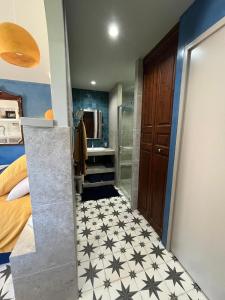 Koupelna v ubytování Maisonnette climatisée