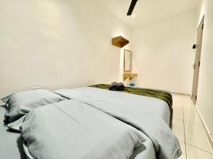 Luxury Holiday Home with Private Pool Langkawi by Zervin客房内的一张或多张床位
