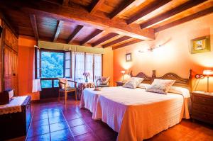 Un pat sau paturi într-o cameră la Casa de Aldea Riosol