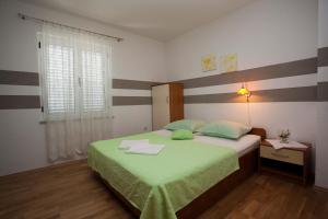 Krevet ili kreveti u jedinici u objektu Apartments Villa Silvia
