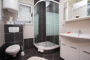 Phòng tắm tại Apartments Villa Silvia +59 ảnh