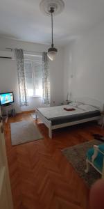 Postel nebo postele na pokoji v ubytování Cricket Park Hostel
