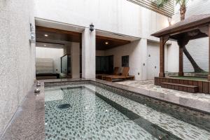Bazén v ubytování OHYA Chain Boutique Motel-Yongkang nebo v jeho okolí