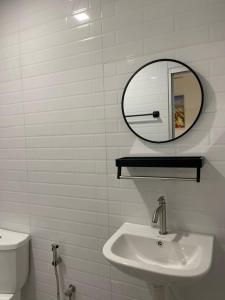 Bagno di TDOZE Hotel