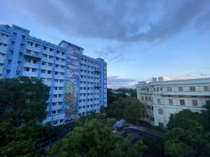 a building with a mural on the side of it at Budget friendly Mini Heaven 2 in Kolkata