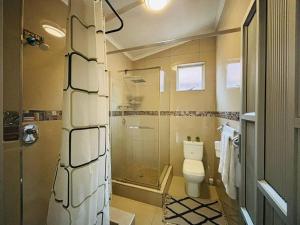 Ένα μπάνιο στο Divine Harvest Guesthouse