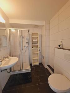 Koupelna v ubytování Zentrale 1 Zimmer Ferienwohnung