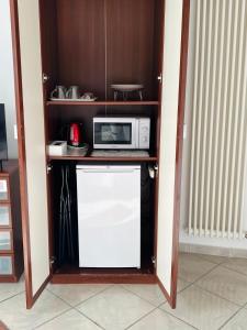 Kuchyň nebo kuchyňský kout v ubytování Amarin Pisa Room