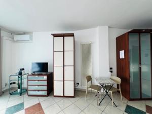 TV a/nebo společenská místnost v ubytování Amarin Pisa Room