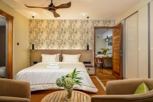 Postel nebo postele na pokoji v ubytování Colombo Villa Collection + 37 fotografií