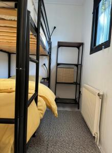 Postel nebo postele na pokoji v ubytování Privacyvol chalet FlER in Putten