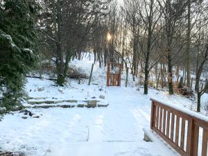 Ảnh trong thư viện ảnh của Ház a Pilisben - mókus család a kertben ở Pilisszentlászló