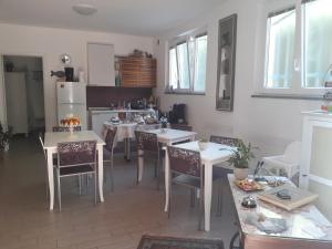 Kuchyň nebo kuchyňský kout v ubytování B&B Ai Tre Archi