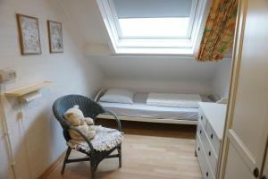 Postel nebo postele na pokoji v ubytování Kustverhuur, Park Schoneveld Duinroos 133