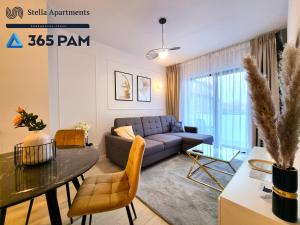 Posezení v ubytování Apartament Gold - 365PAM + 8 fotografií