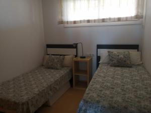 Ένα ή περισσότερα κρεβάτια σε δωμάτιο στο B92f, Lake View +16 φωτογραφίες