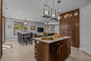 a kitchen and dining room with a table in the background at Entrada at Moab 420 and 424 in Moab