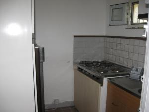 a kitchen with a stove and a stove top oven at Agriturismo Il Casotto in Maida +81 photos