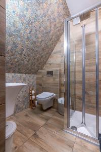 Kúpeľňa v ubytovaní Folkowy Dworek SPA & Fun