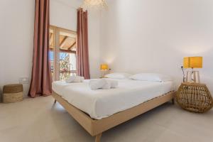 Ένα ή περισσότερα κρεβάτια σε δωμάτιο στο Suite Dreams +23 φωτογραφίες