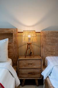 Postel nebo postele na pokoji v ubytování Narada Suite & Villa
