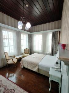 Postel nebo postele na pokoji v ubytování Bursa İpekyolu Hotel