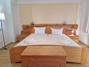 Voodi või voodid majutusasutuse Ferienwohnung Ostseeheim - 1 Reihe mit Meerblick toas