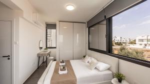 Katil atau katil-katil dalam bilik di Villa Iva by the Sea +81 gambar