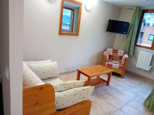 Μια τηλεόραση ή/και κέντρο ψυχαγωγίας στο Terrasses D 309 PARC NAT VANOISE appart 4 pers