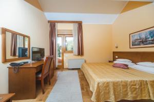 Postel nebo postele na pokoji v ubytování Hotel Stella di Mare