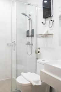 Koupelna v ubytování Kekehyu Business Hotel