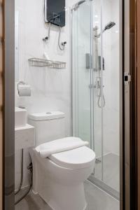 Koupelna v ubytování Kekehyu Business Hotel