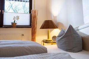 Ein Bett oder Betten in einem Zimmer der Unterkunft Bismarckstraße 27