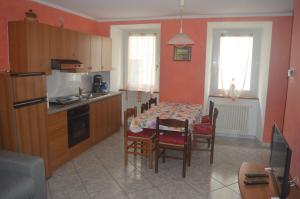 Kuchyň nebo kuchyňský kout v ubytování Residence Arvinei