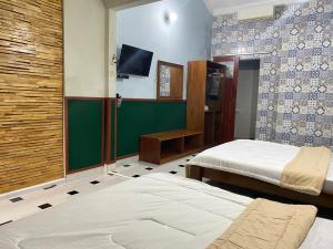 Letto o letti in una camera di ADA Homestay