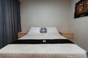 Postel nebo postele na pokoji v ubytování Kelating Dream Guest House