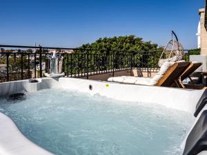 The swimming pool at or close to In Camera Art Boutique Hotel
