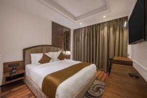 Ένα ή περισσότερα κρεβάτια σε δωμάτιο στο Echor Baris Resort Mussoorie