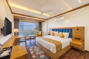 Voodi või voodid majutusasutuse Echor Baris Resort Mussoorie toas