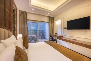 Ένα ή περισσότερα κρεβάτια σε δωμάτιο στο Echor Baris Resort Mussoorie