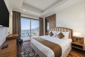 Ένα ή περισσότερα κρεβάτια σε δωμάτιο στο Echor Baris Resort Mussoorie
