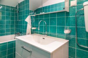 Koupelna v ubytování Stadtbauernhof Salzburg - Ferienwohnung - Gut Unterleithen